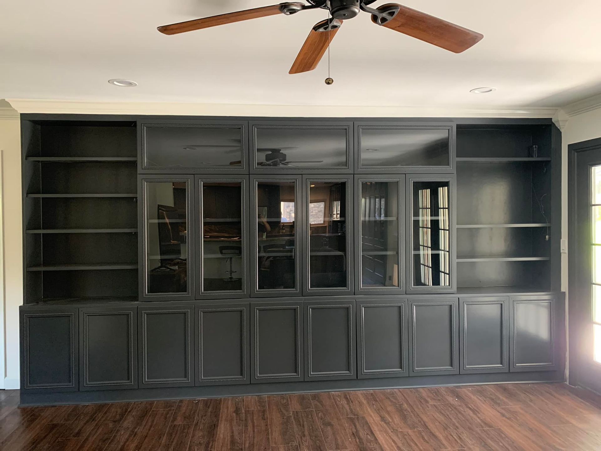 Sherwin Williams Tricorn Black painted cabinets in Des Moines, Iowa.