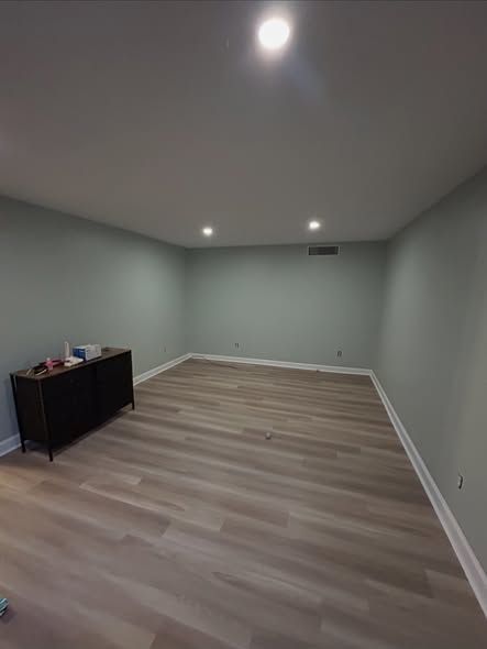 Painted interior bedroom gray walls and white trim in Urbandale, Iowa.