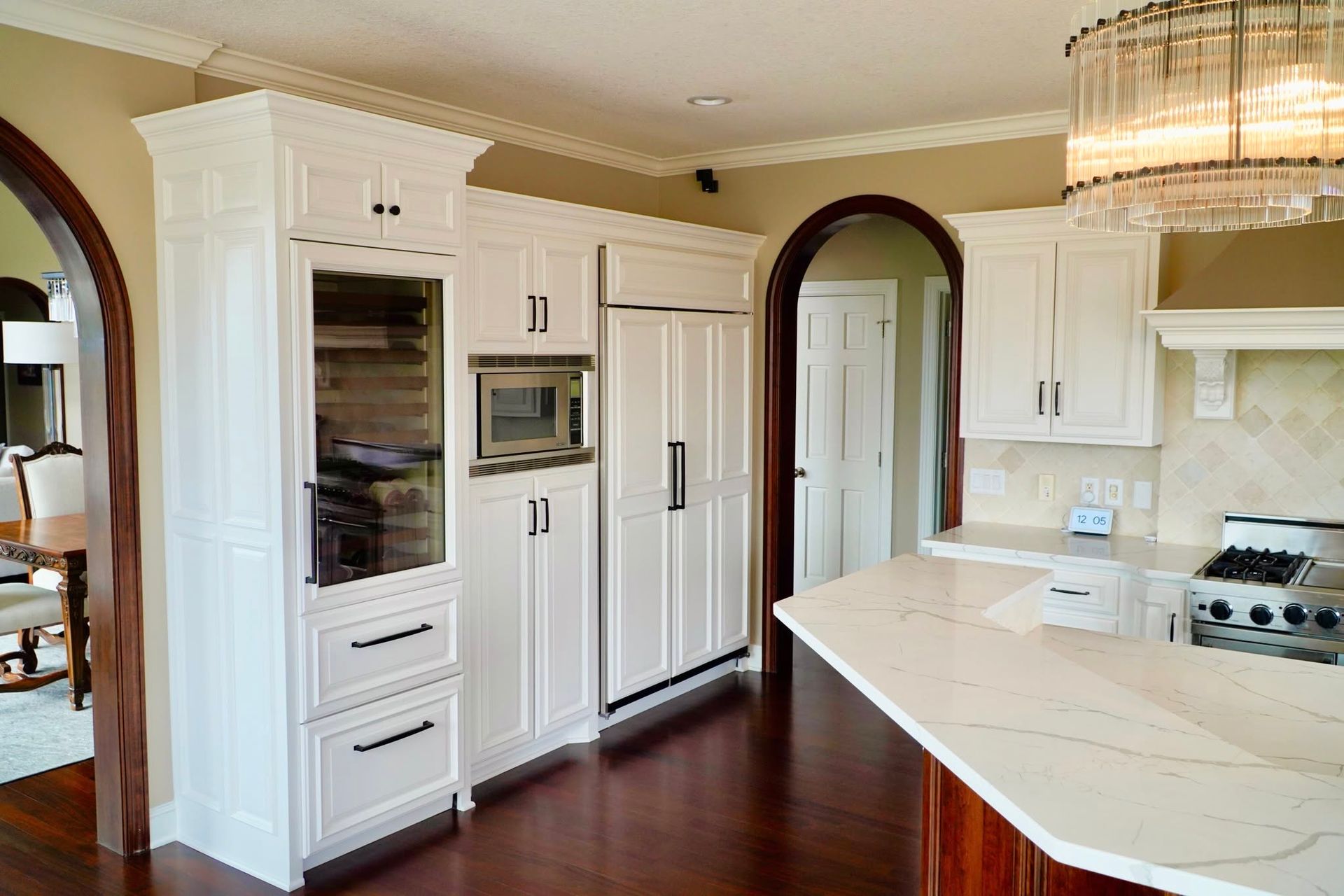 Freshly painted kitchen cabinets of interior home with new flooring.