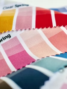 Color swatches in various shades of red, pink, orange, and blue. Text labels include “Clear Spring.”