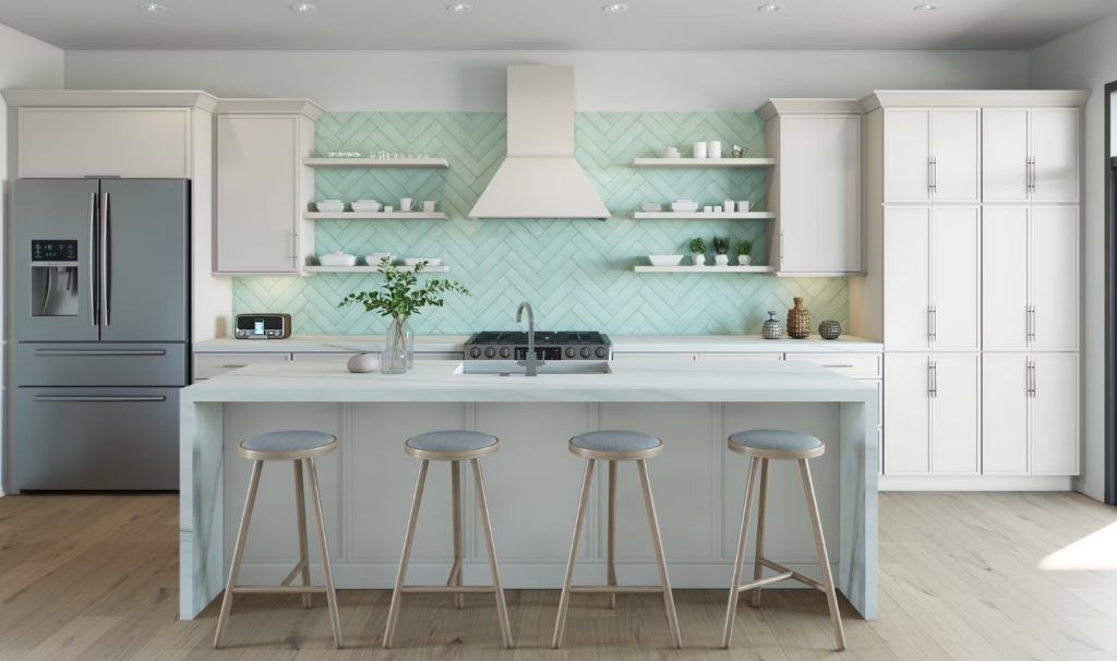 Modern kitchen with white cabinets, island, and blue tile backsplash; stainless steel appliances.