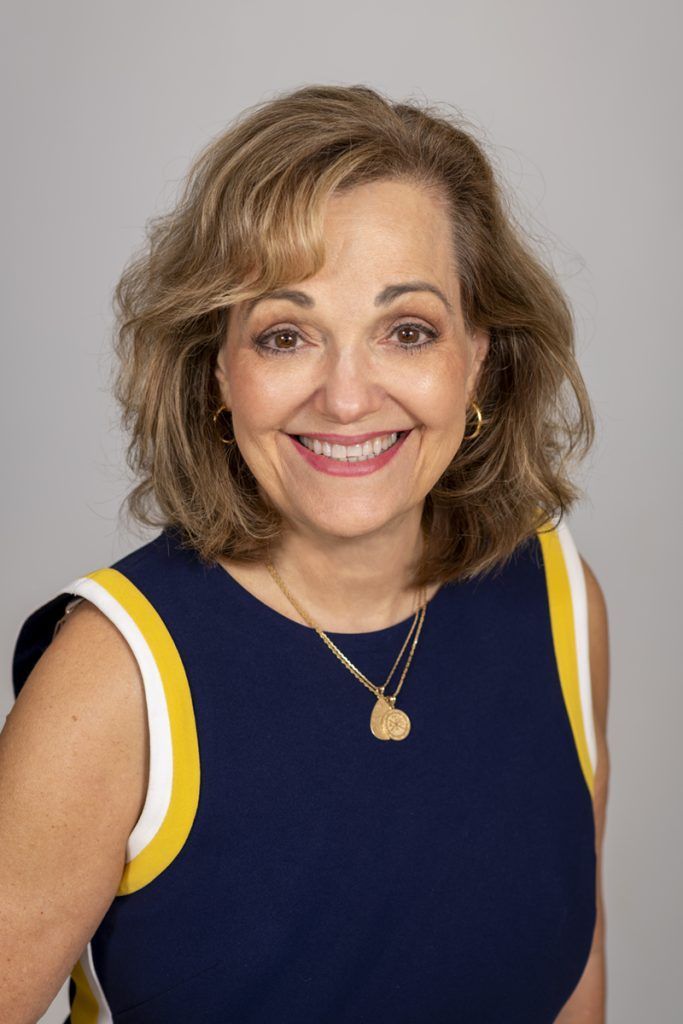 Photo of {{Team Member Name}}