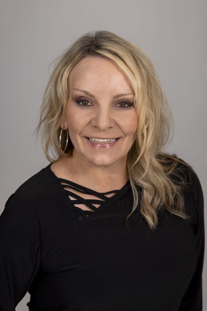 Photo of {{Team Member Name}}