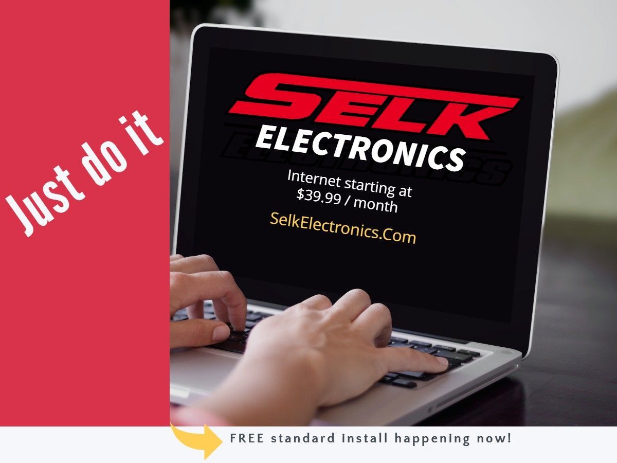 A person is typing on a laptop that says selk electronics