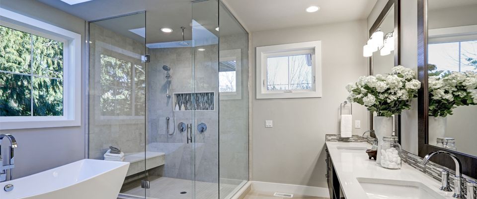 Glass shower enclosure