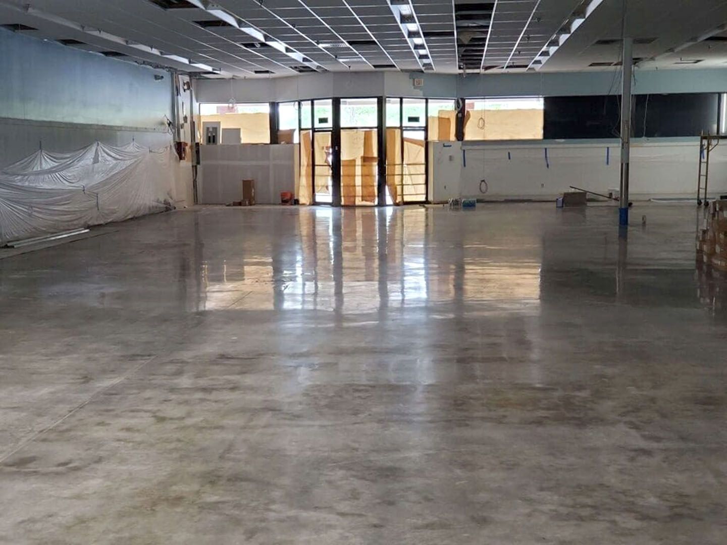 Empty commercial space with coated concrete floor