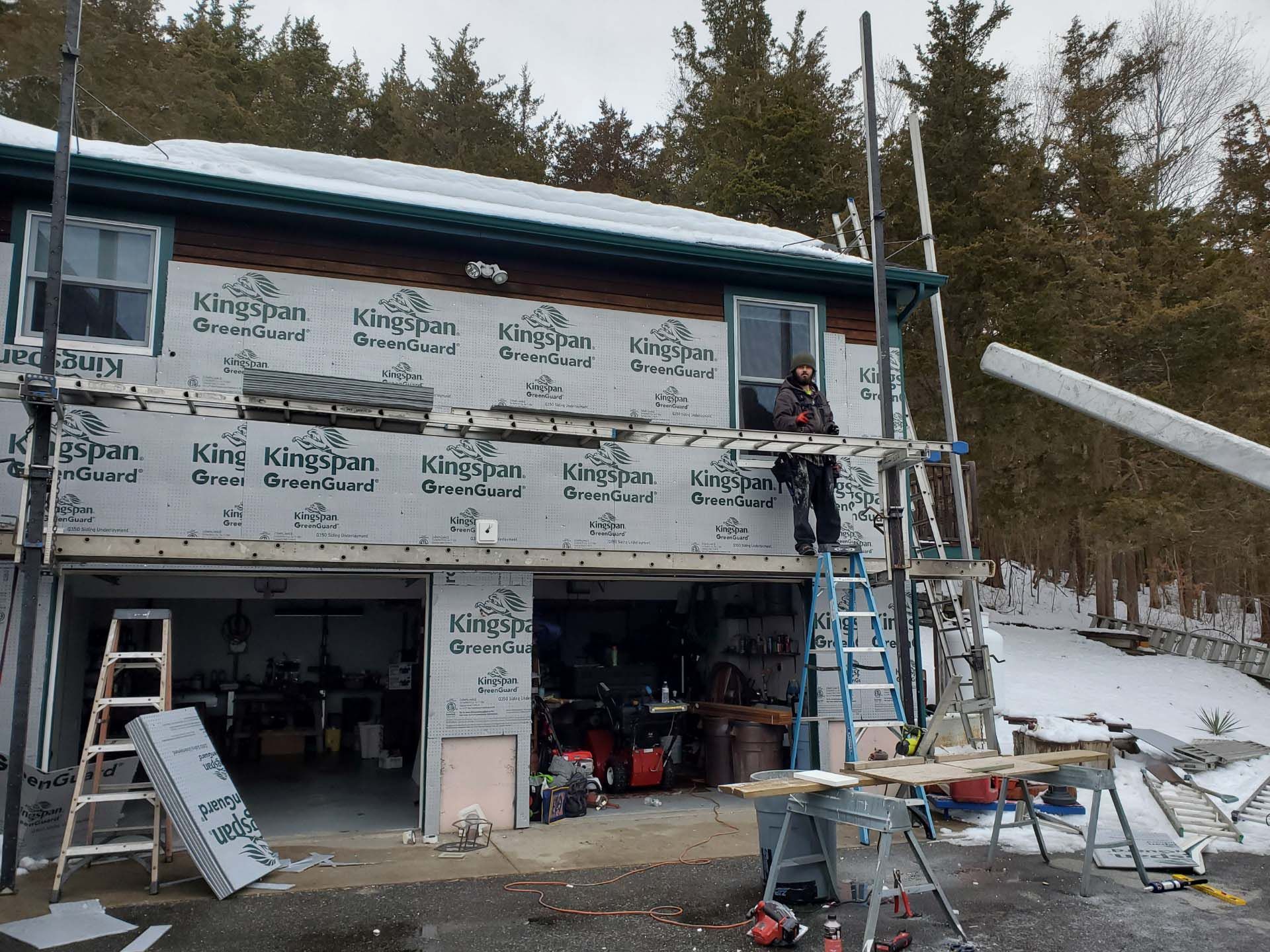 A house is being remodeled with kingspan siding