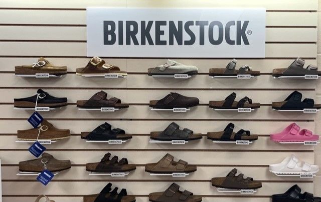 A display of birkenstock shoes in a store