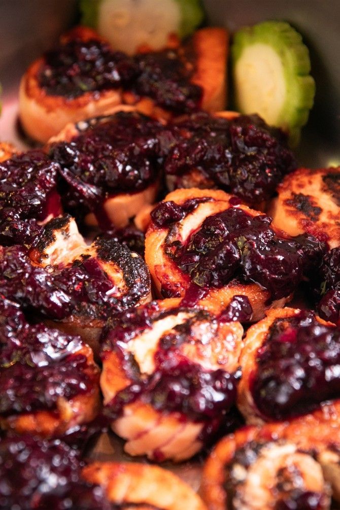 A close up of a plate of food with sauce on it.