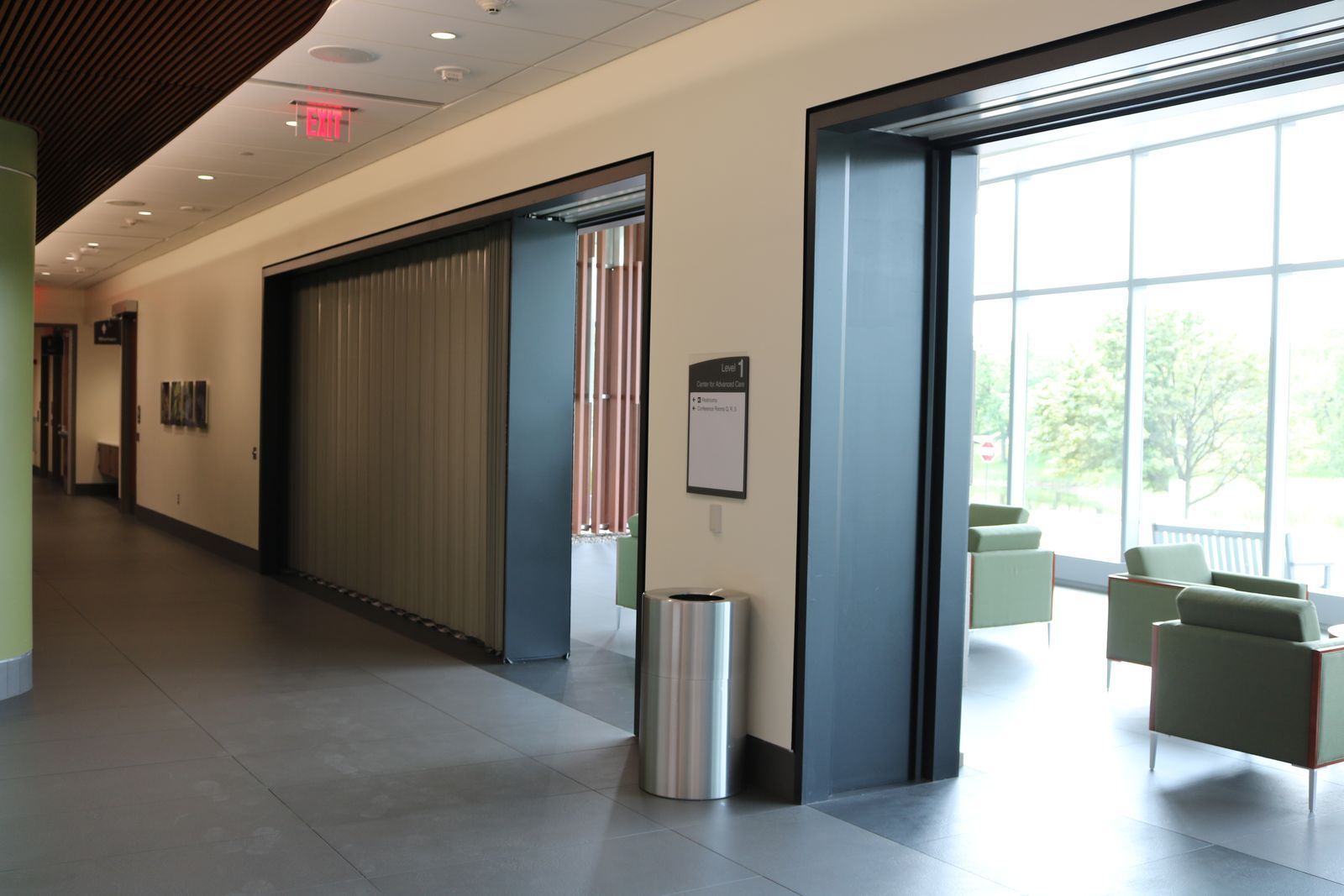 A long hallway with accordion-style fire doors
