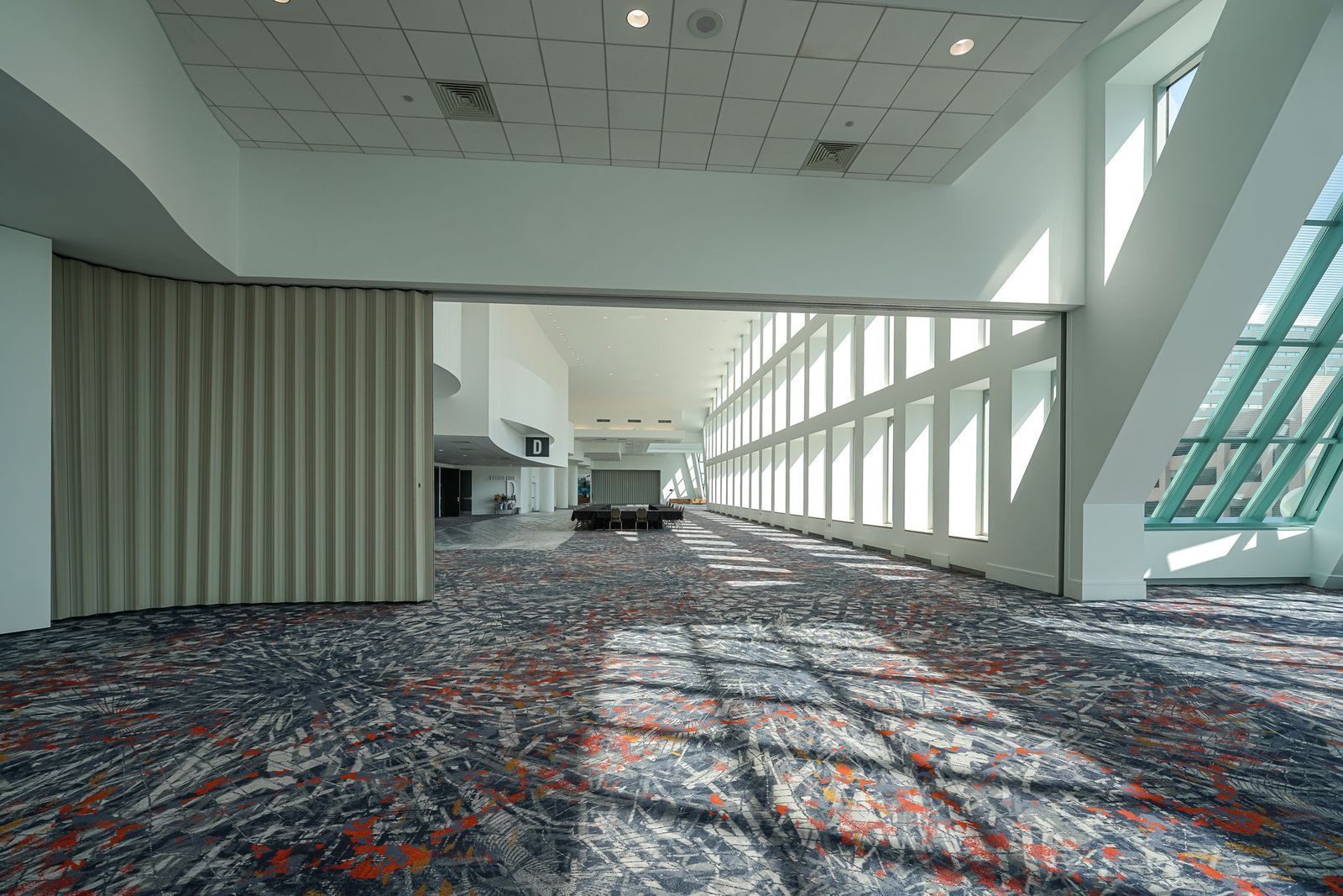Hallway with accordion doors with sound barriers