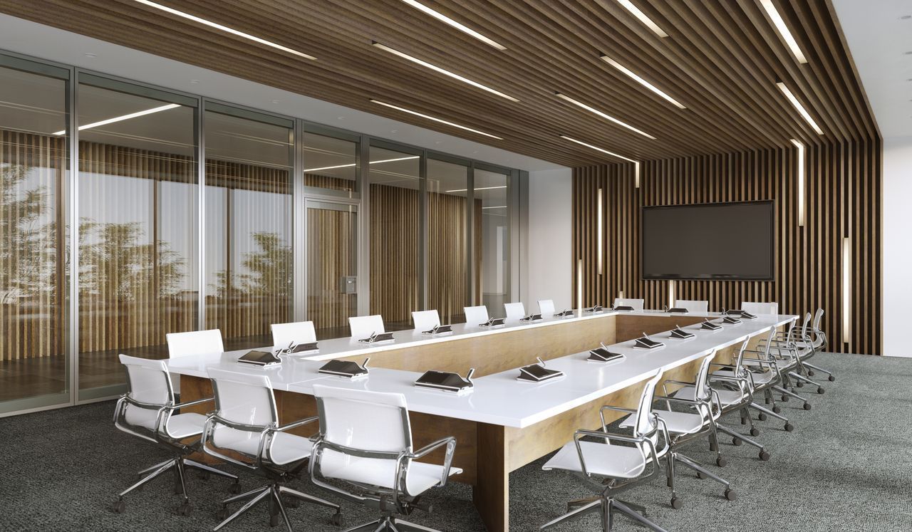 Conference room with a long table and chairs