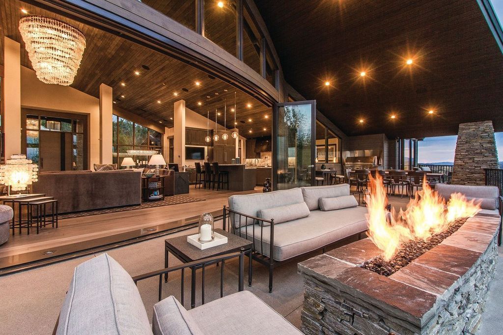 A large house with a fire pit