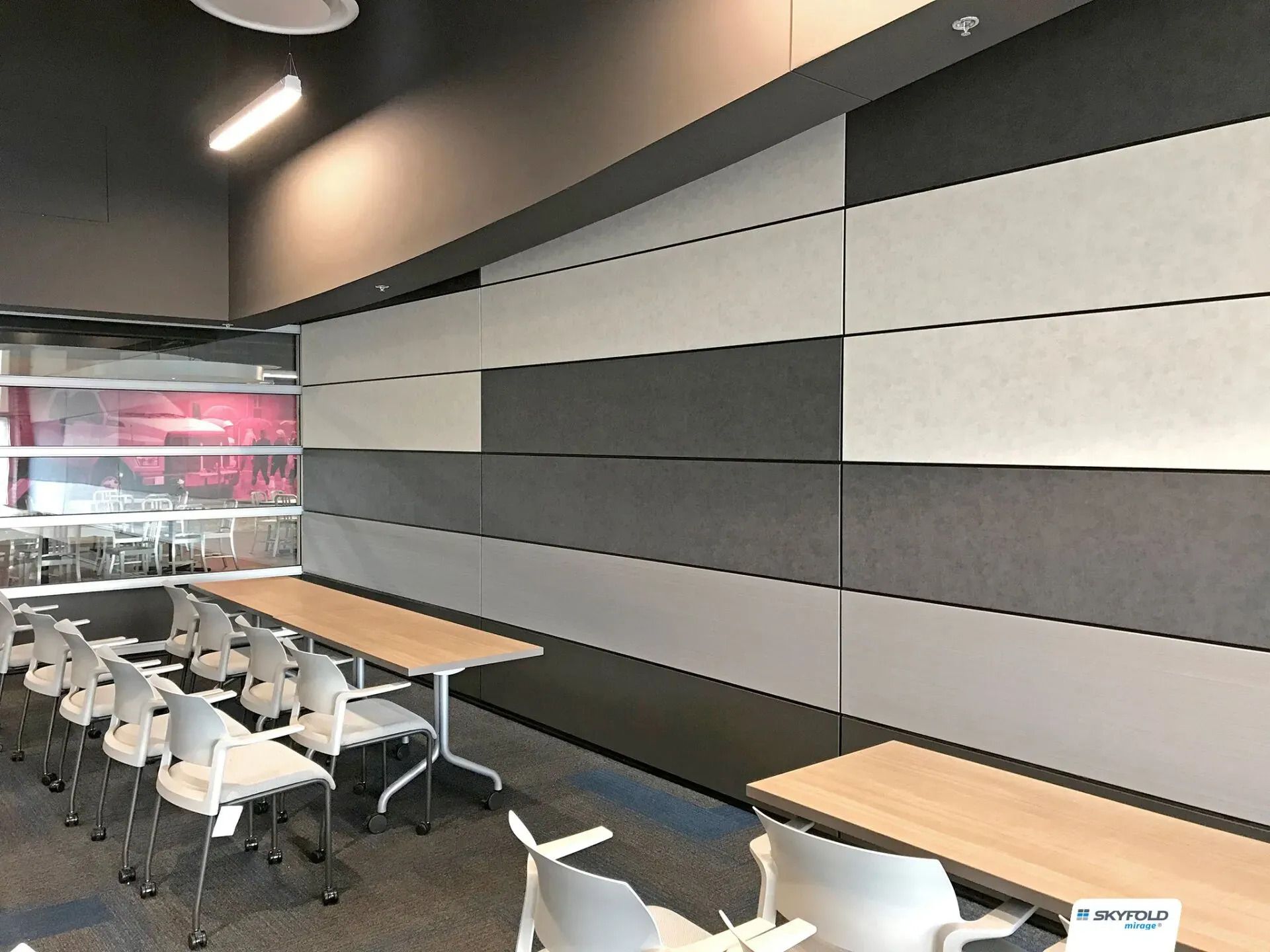 A room with tables and chairs