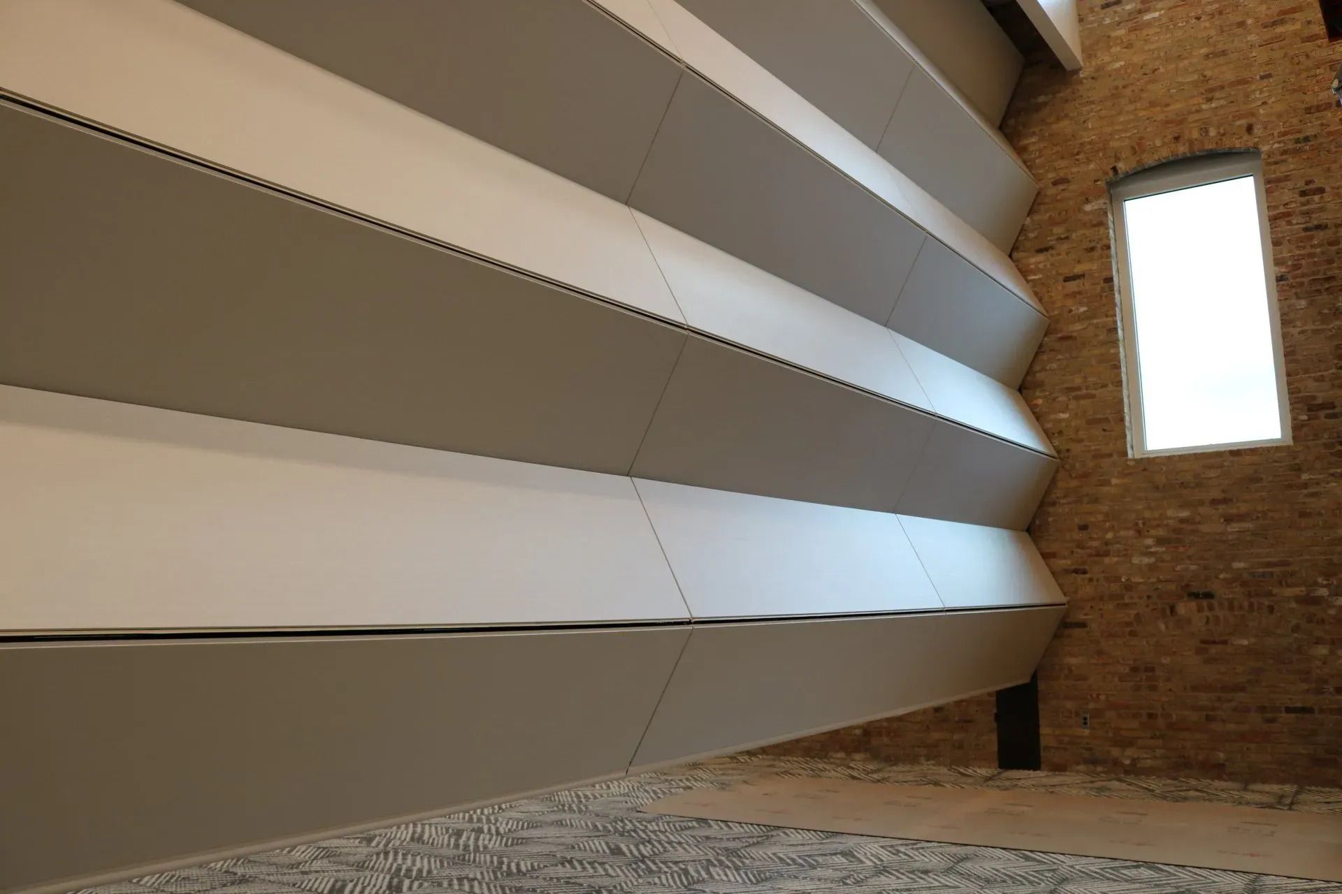 Vertical folding wall
