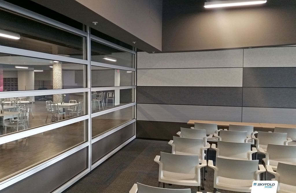 Transparent divider in a room