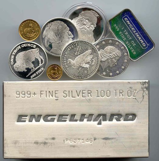 Silver coins and bar: various coins, including a silver bar with 