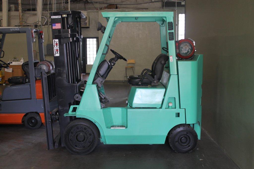 Teal color forklifts