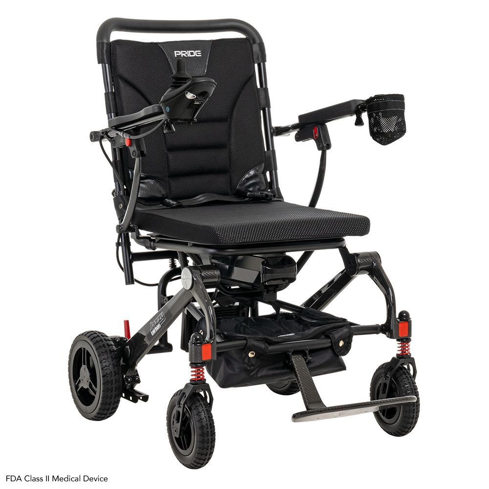 Black powered wheelchair with joystick, front caster, and rear wheels on a white background