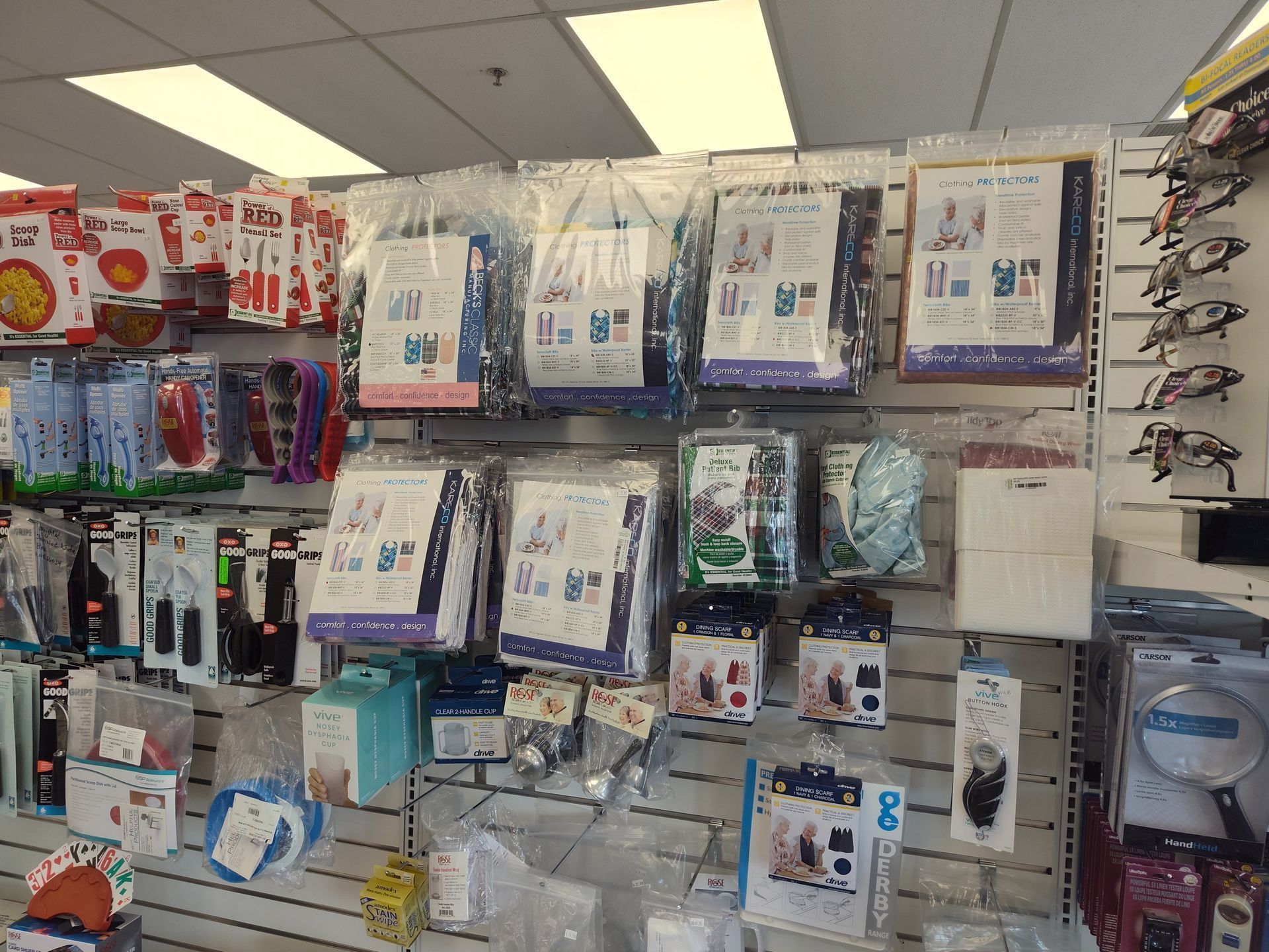 Shelves stocked with sewing patterns and supplies in a store.
