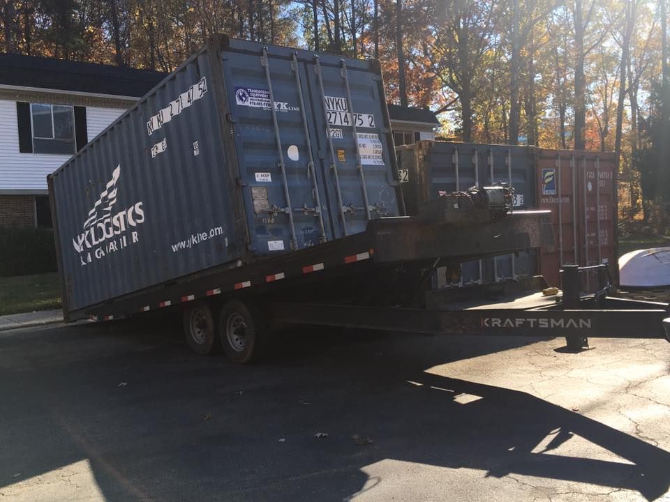 A container on a trailer with the word logistics on it