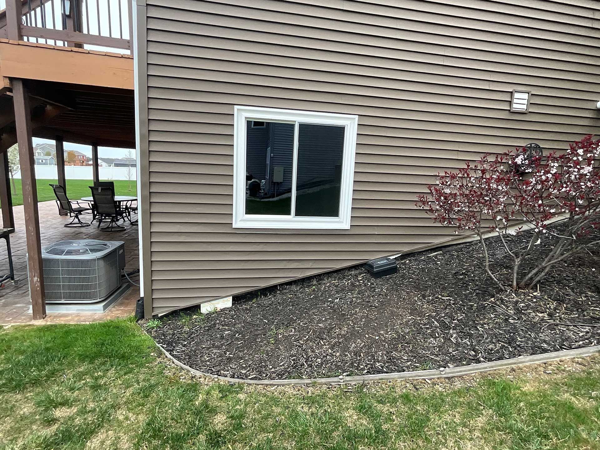 a house with a large window on the side of it
