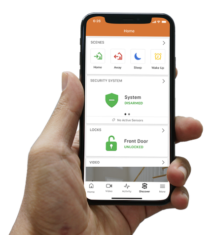 Security camera, black housing, mounted on a white pole, observing an outdoor setting.