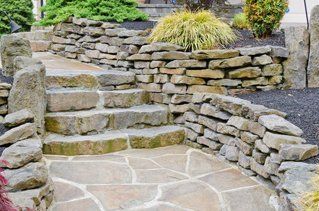 Retaining wall and stone walkway