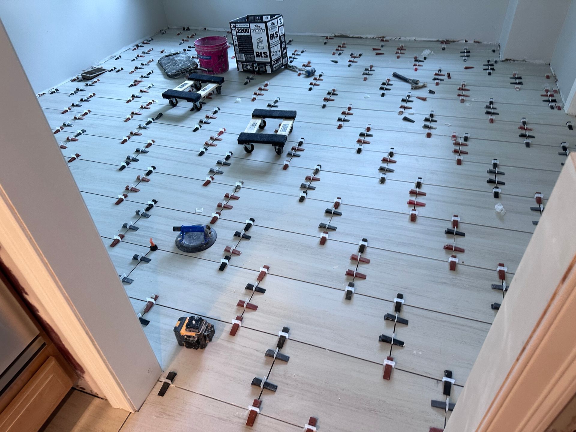 A room with a lot of tiles on the floor