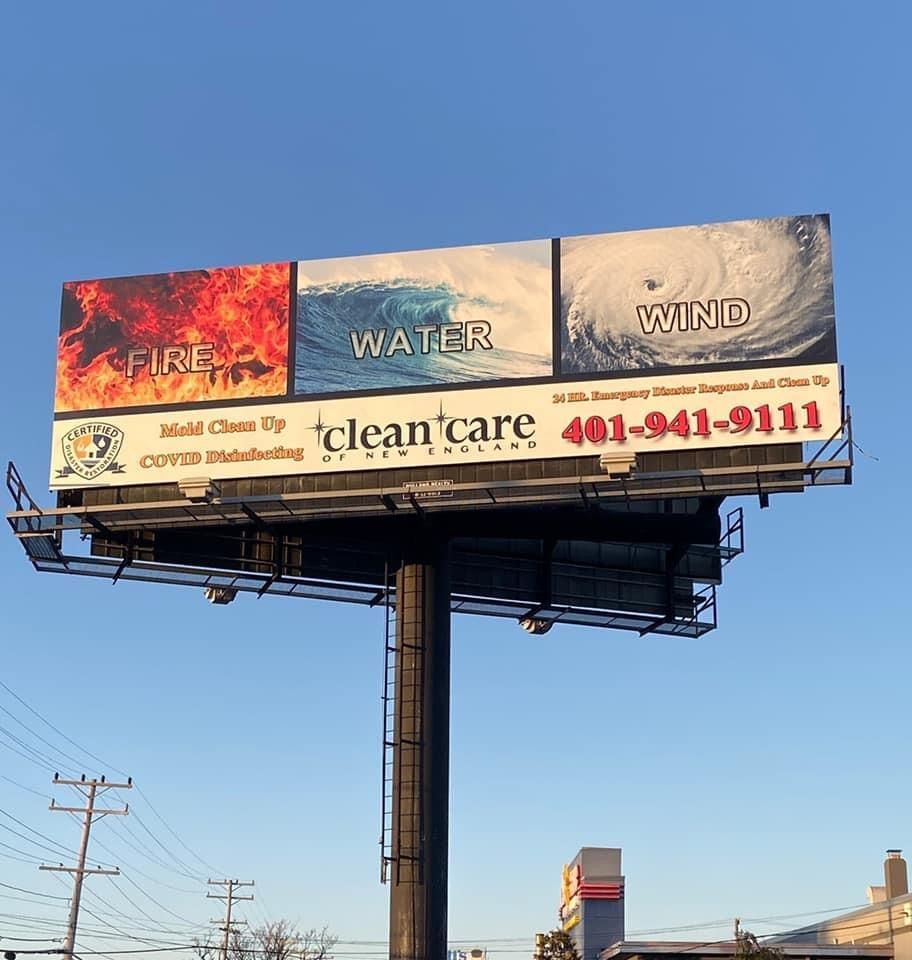 A billboard for clean care advertising fire water and wind