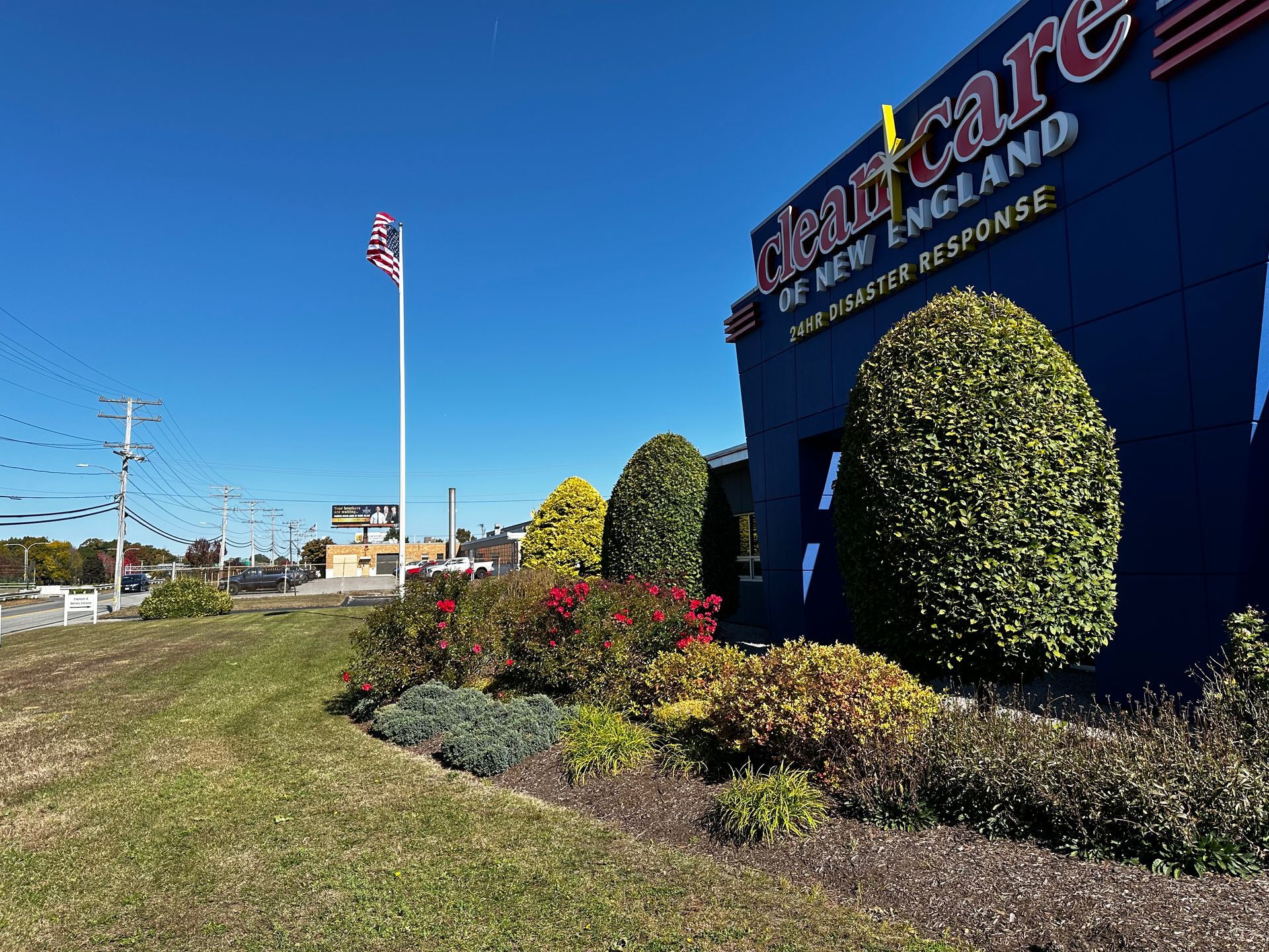 A blue building with the word clean care on it