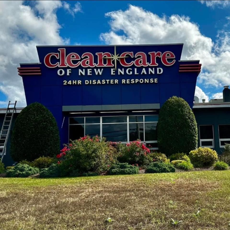 A blue building with a sign that says healthcare of new england