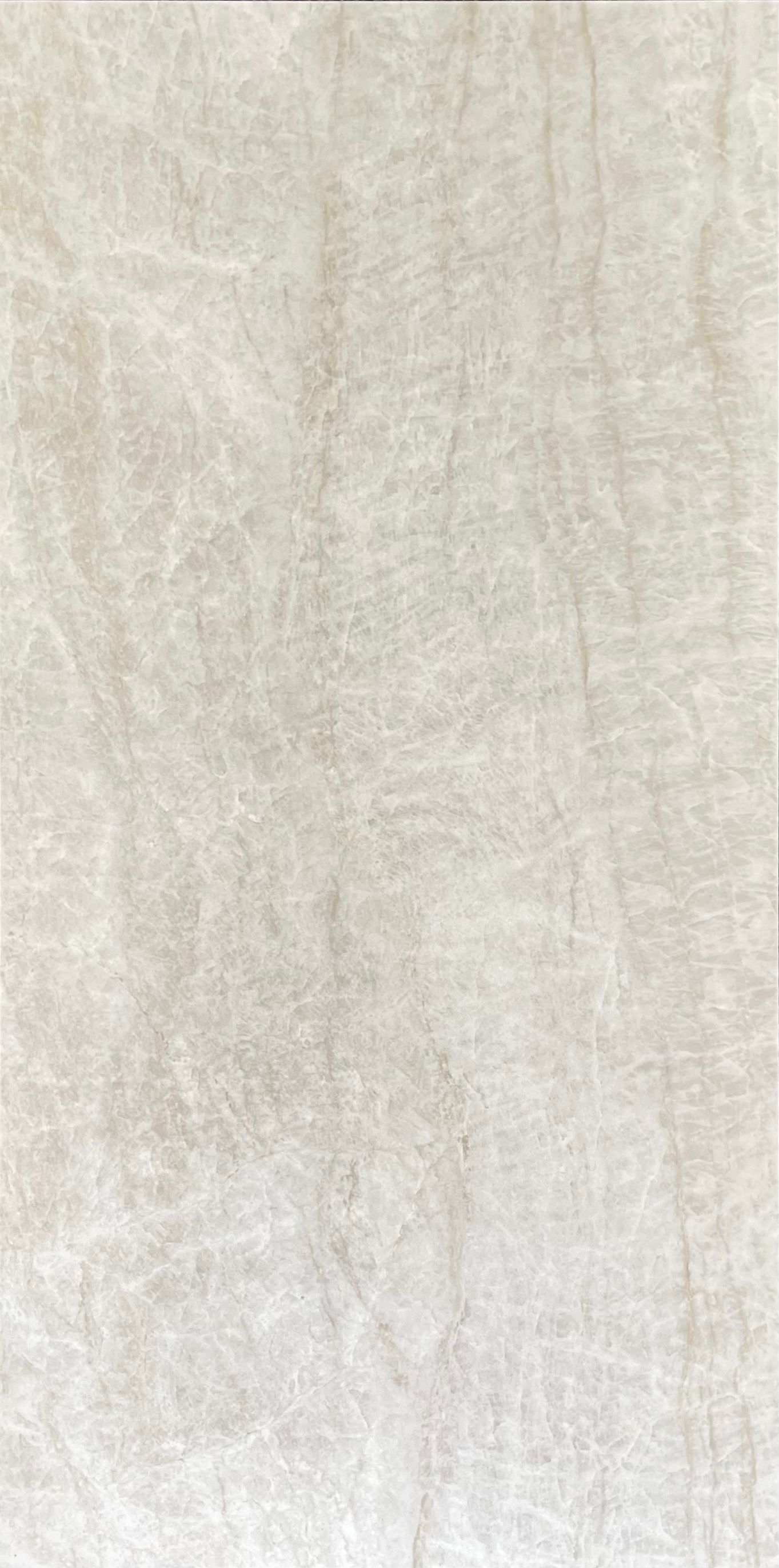 Two light gray ceramic tiles, vertically aligned, with subtle veining.