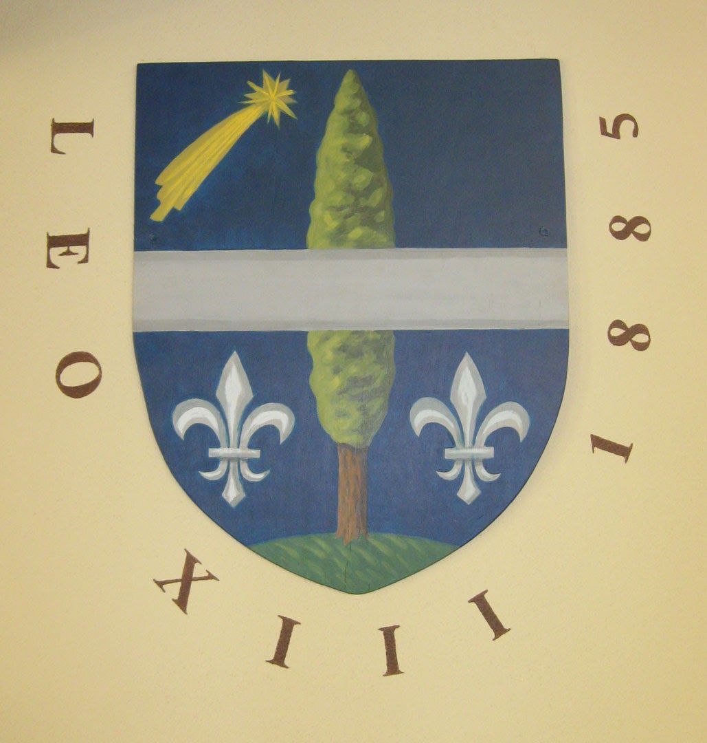 A picture of a coat of arms with the year 1988