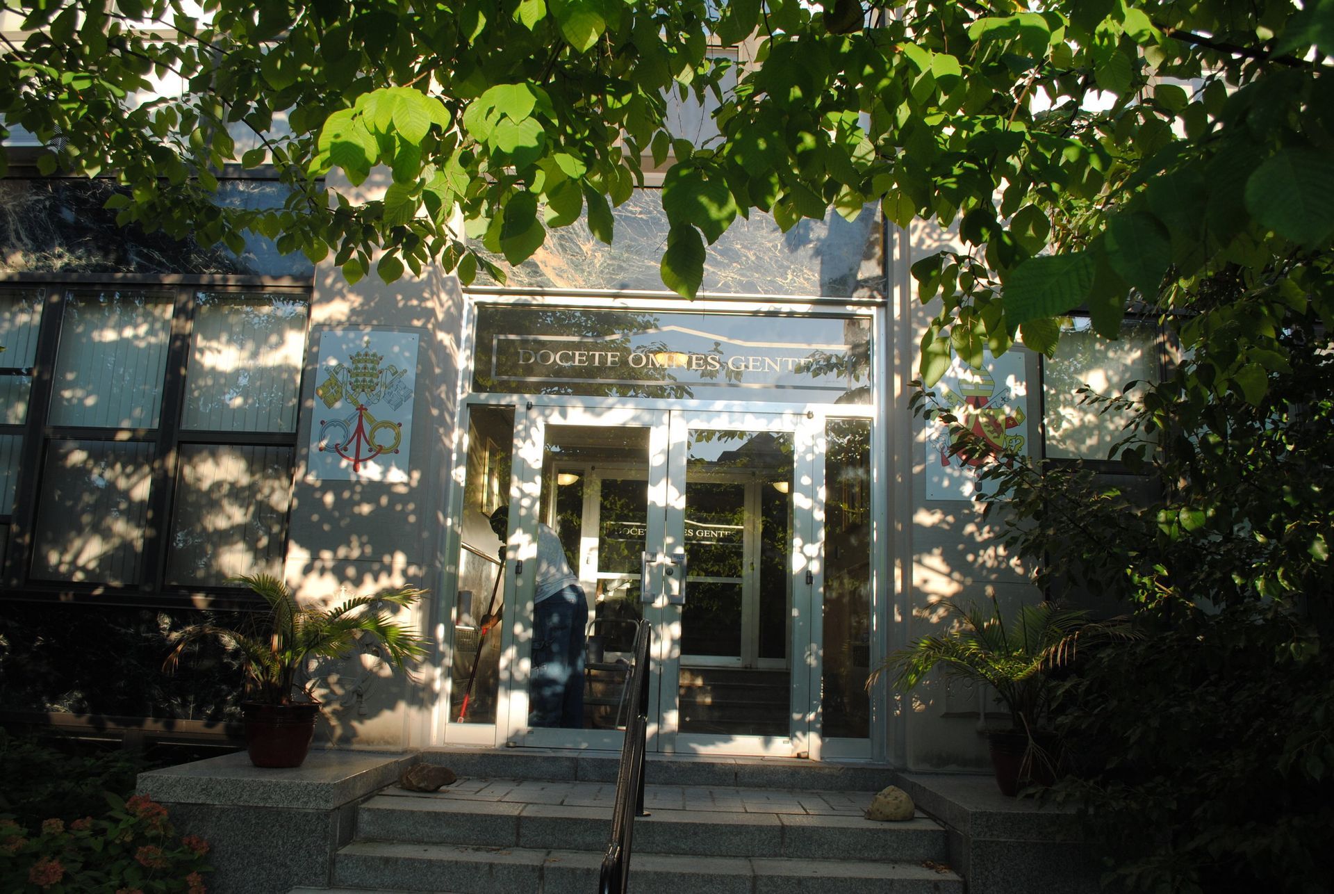 A building with a sign that says ' jc ' on it