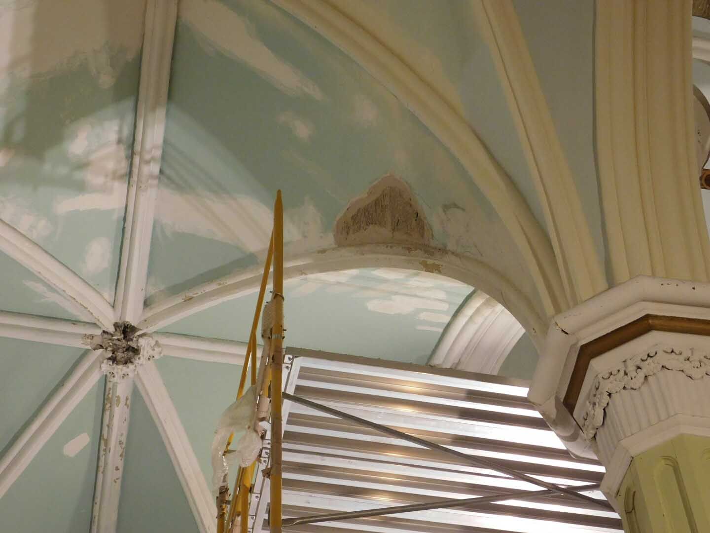 A ceiling with a scaffolding in front of it