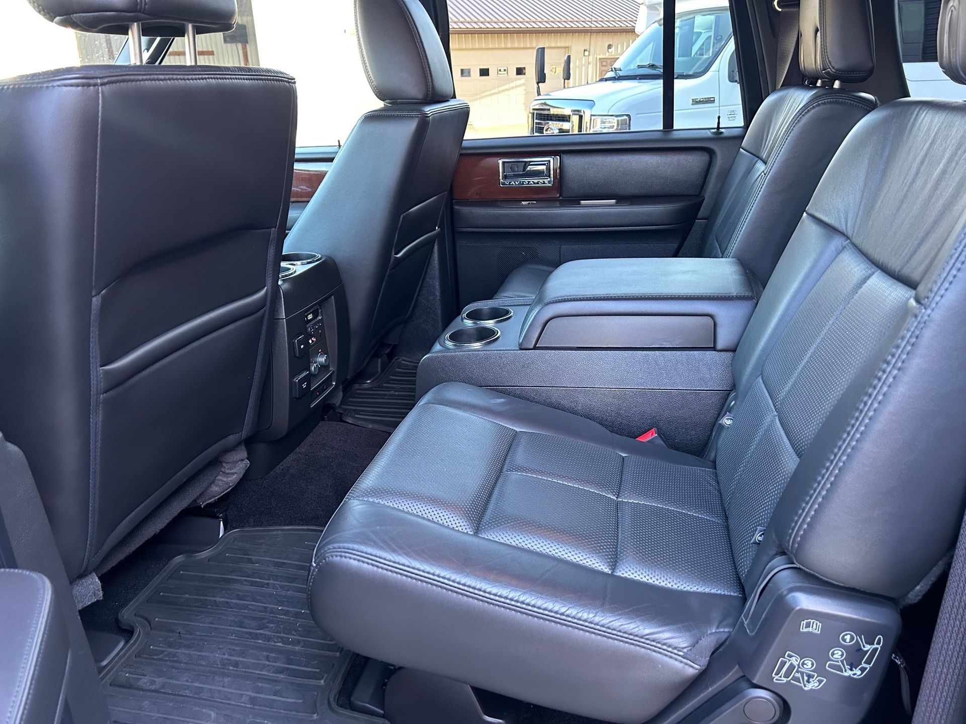 The back seat of a car is shown