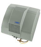 Gray outdoor air-conditioning unit with vents and pipes attached