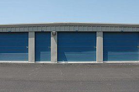 Storage garages with blue doors