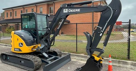 A yellow and black excavator