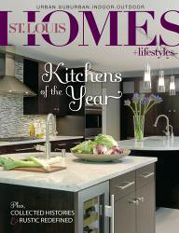 St. Louis Homes & Lifestyles Magazine cover featuring a modern kitchen with dark cabinets, white island, and the title Kitchens of the Year.