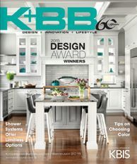 A magazine cover showing a white kitchen with a center island, glass-front cabinets, and the text 2015 DESIGN AWARD.
