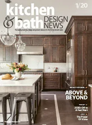 The cover of Kitchen & Bath Design News magazine featuring a modern kitchen with dark wood cabinets and a white island.