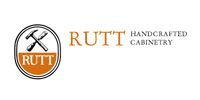 The Rutt Handcrafted Cabinetry logo featuring a circular icon with crossed hand tools over the brand name.