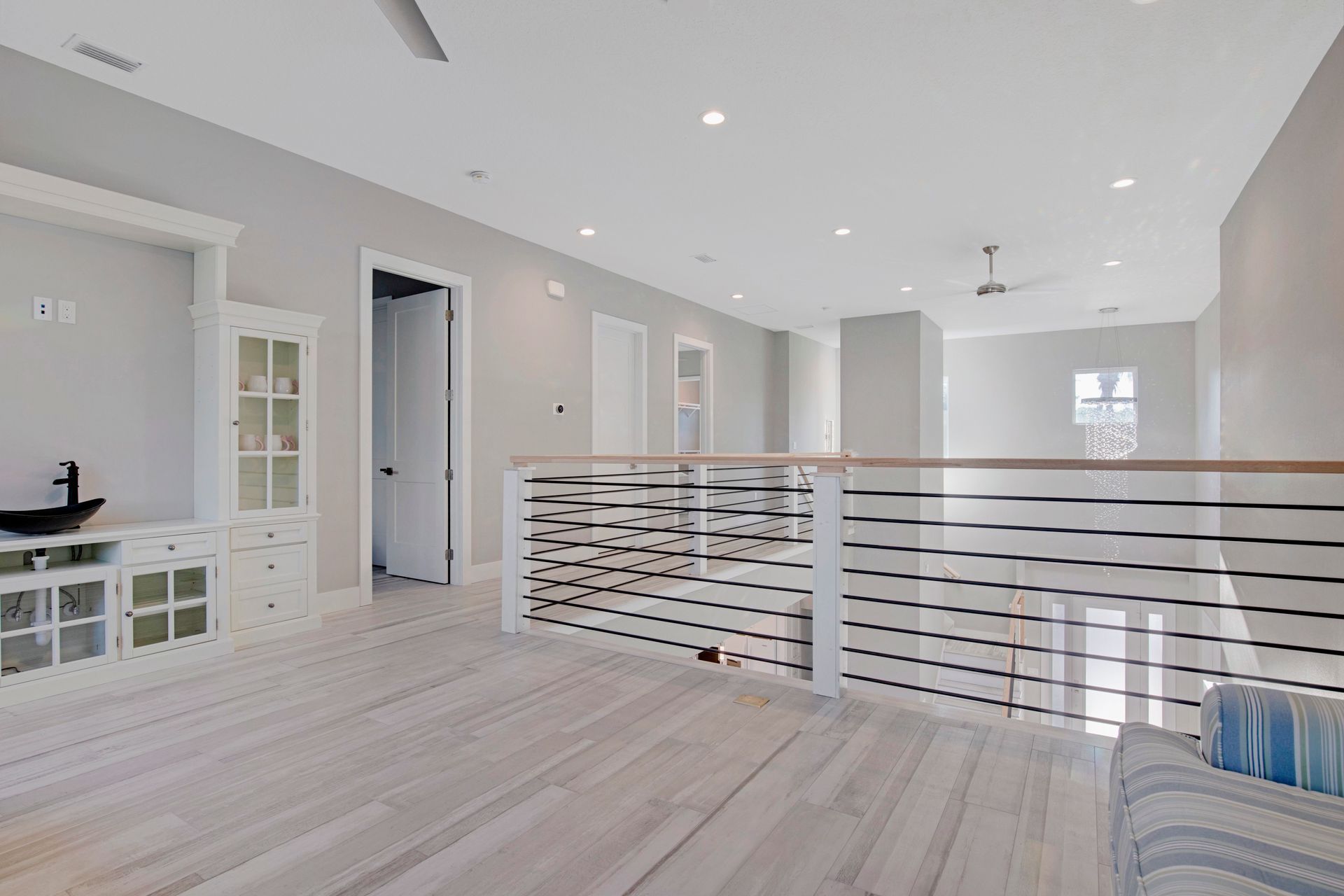 There is a balcony in the middle of the room.