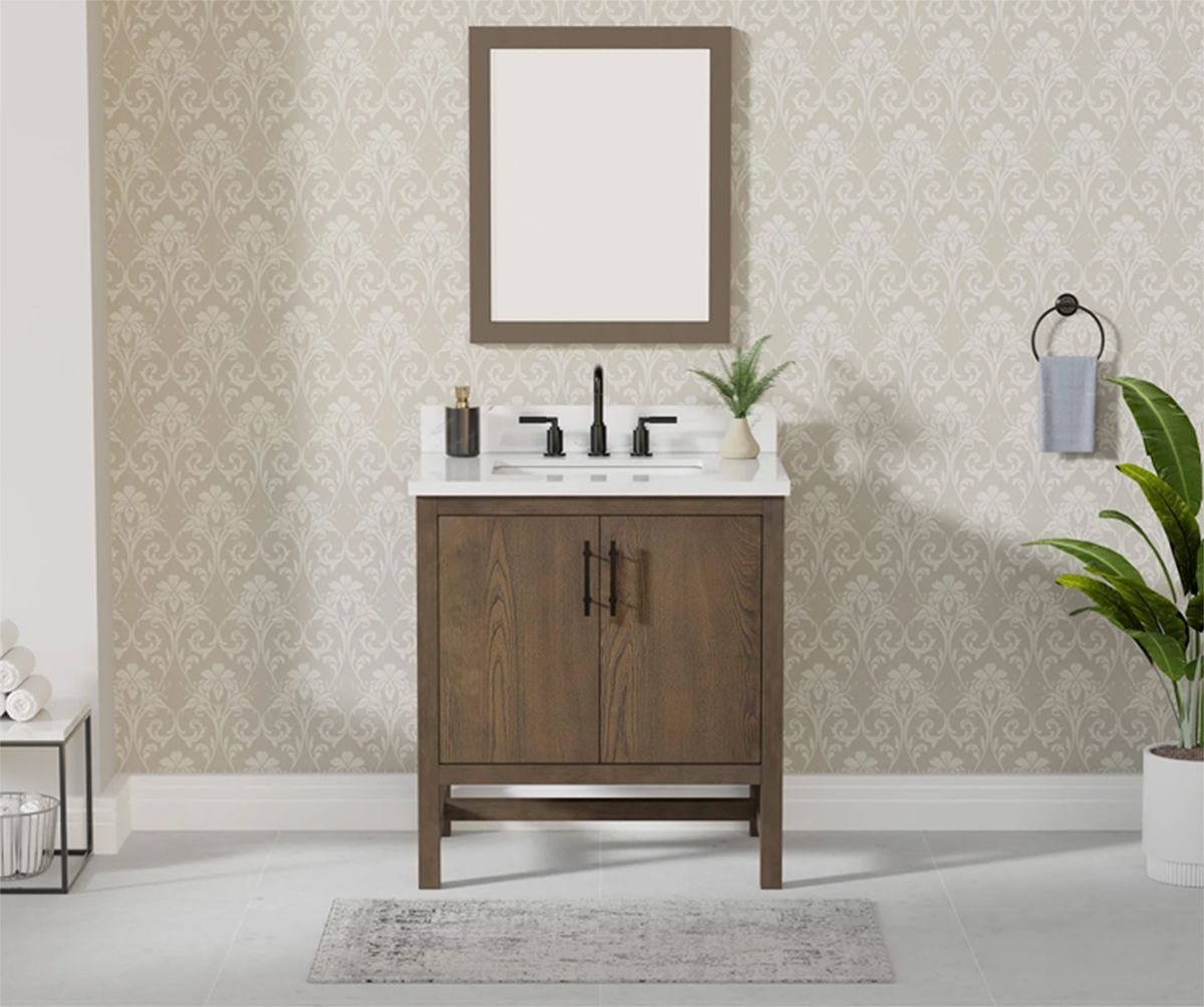 Modern bathroom vanity with wood cabinet, white sink, mirror, and potted plants