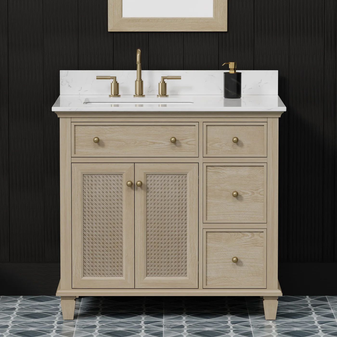 Cream bathroom vanity with white marble top, gold fixtures, and woven cabinet doors against a dark wall