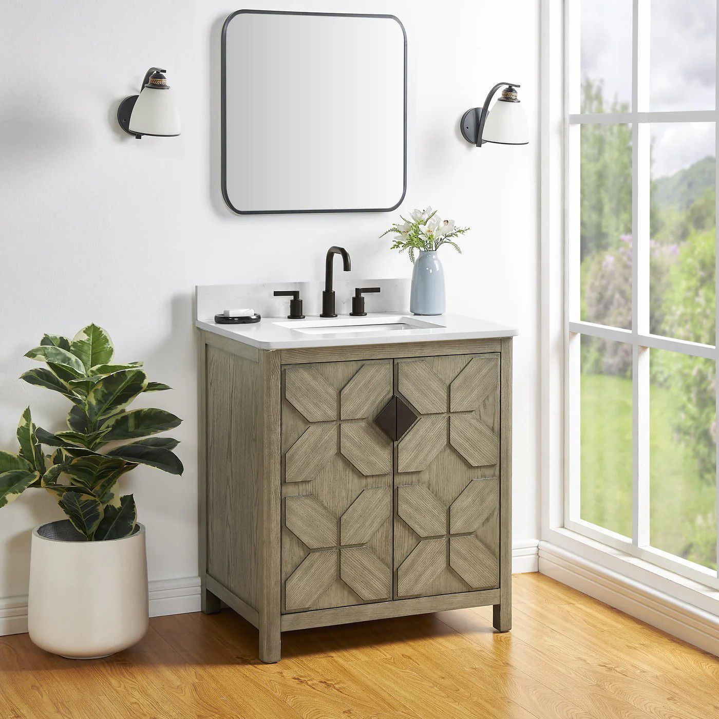 Modern bathroom vanity with carved wood cabinet, mirror, sink, plants, and bright window light