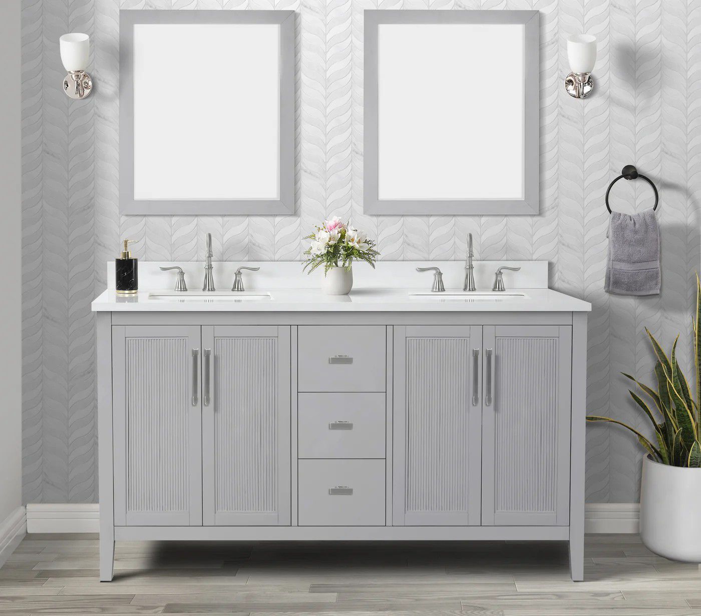 Modern bathroom vanity with double sinks, two mirrors, and a potted plant on the right