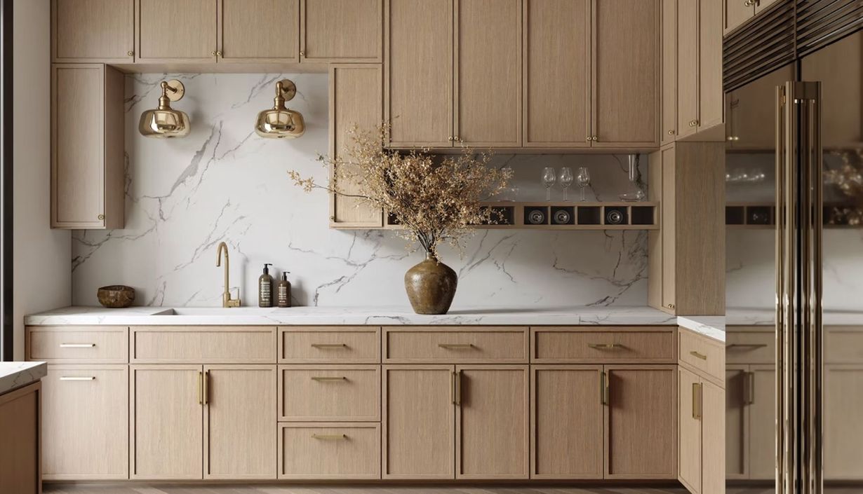 Kitchen under renovation with white cabinets and a dark island in the center